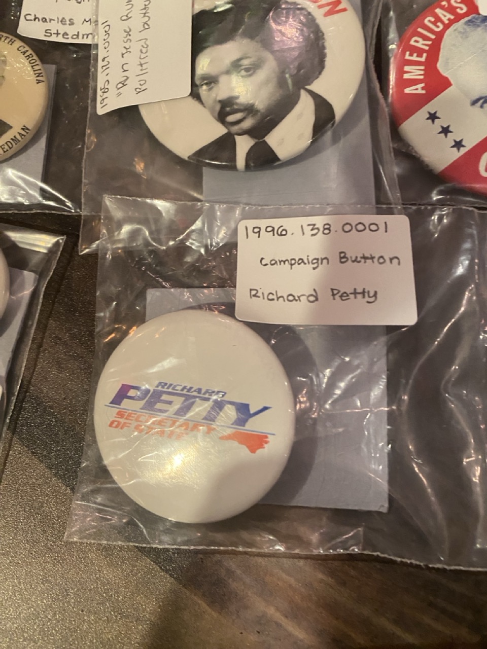 Pinback buttons for Richard Petty, Jesse Jackson and others